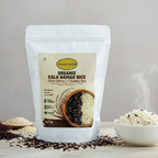Package of Organic Kala Namak Rice with rice and ingredients on a light background